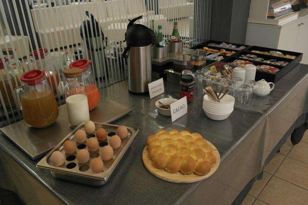 Kleopatra Design Hotel Неаполь Ресторан фото